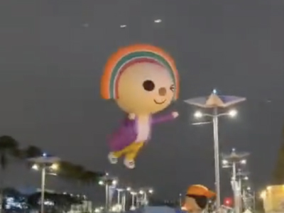 強風で飛ばされる台湾セブンの気球”OPENちゃん”