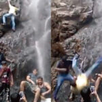 滝の上から落ちる男性（インド）