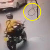 道路に垂れ下がったケーブルに突っ込むバイク（中国）